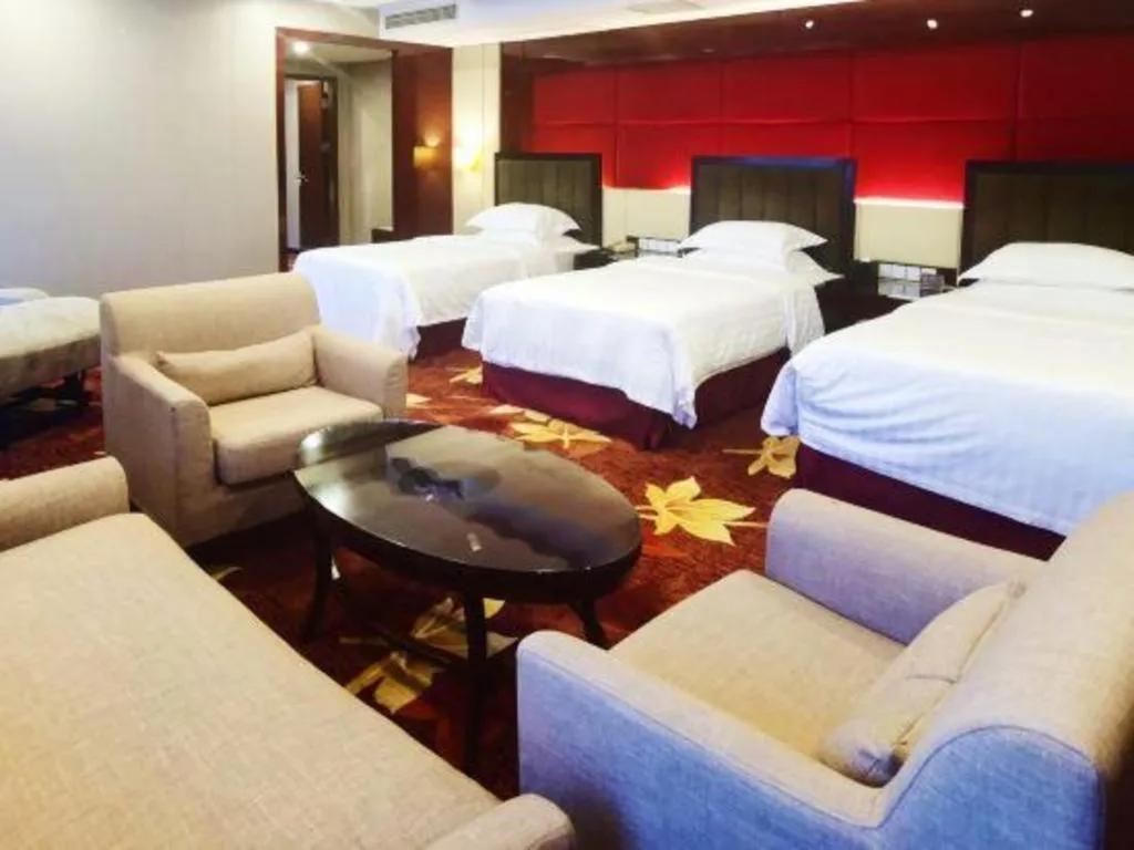 Bed in West International Trade Grand Hotel