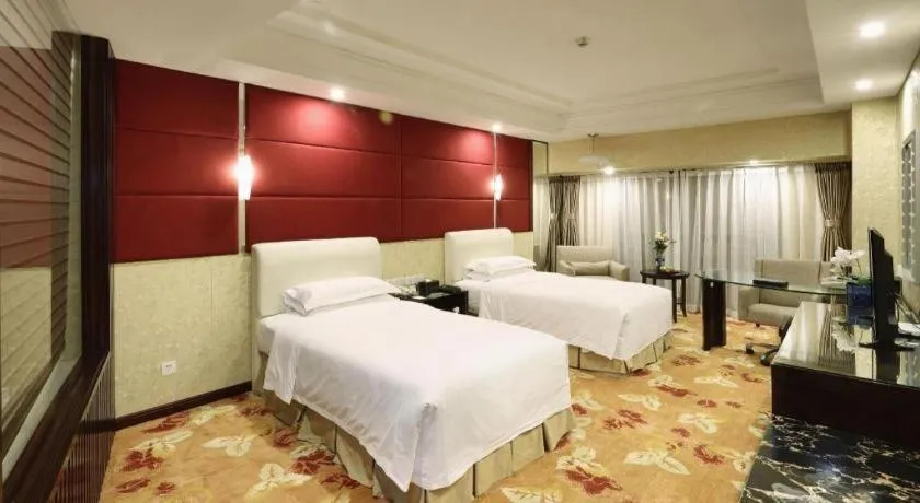 Bed in West International Trade Grand Hotel