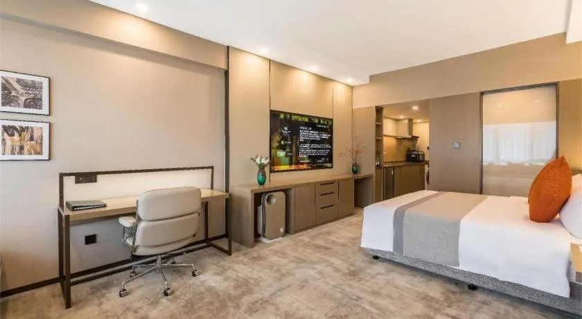 Bed in West International Trade Grand Hotel