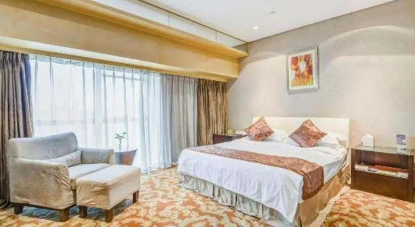 Bed in West International Trade Grand Hotel