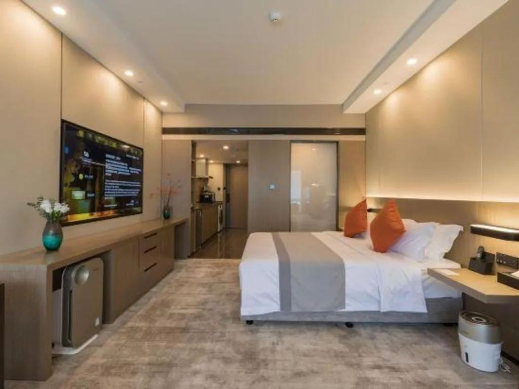 Bed in West International Trade Grand Hotel