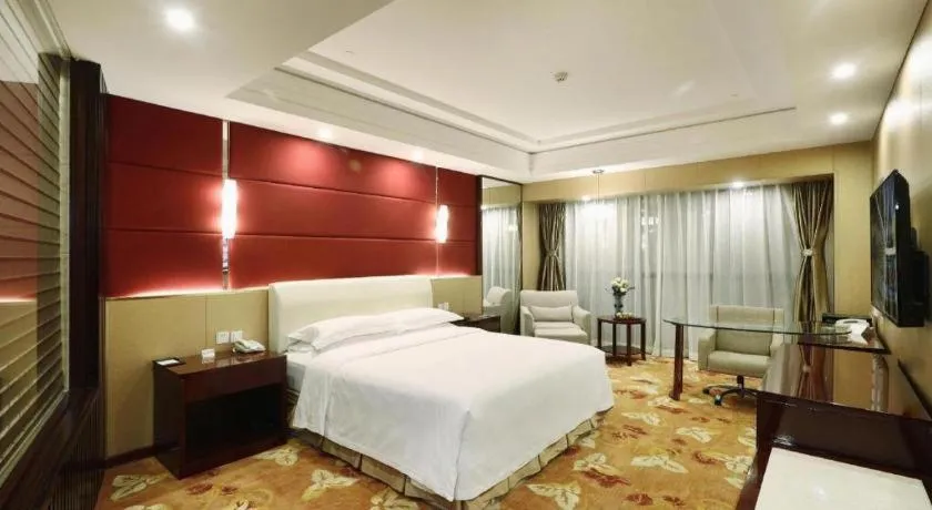 Bed in West International Trade Grand Hotel