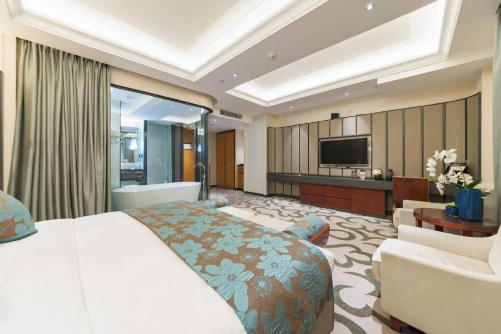 Bed in West International Trade Grand Hotel