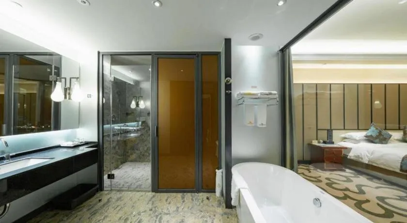 Bed in West International Trade Grand Hotel