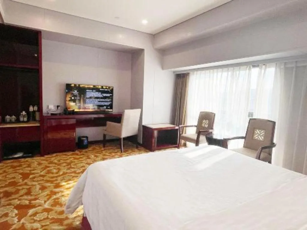 Bed in West International Trade Grand Hotel