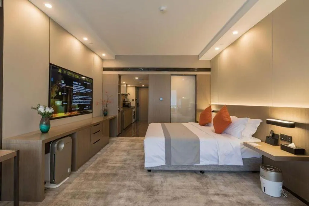 Bed in West International Trade Grand Hotel