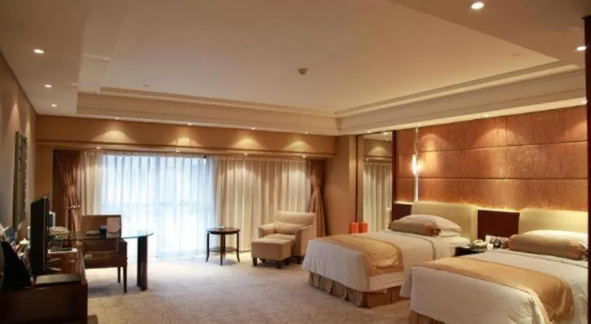 Bed in West International Trade Grand Hotel