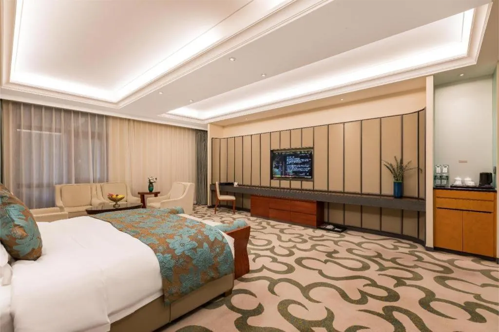 Bed in West International Trade Grand Hotel