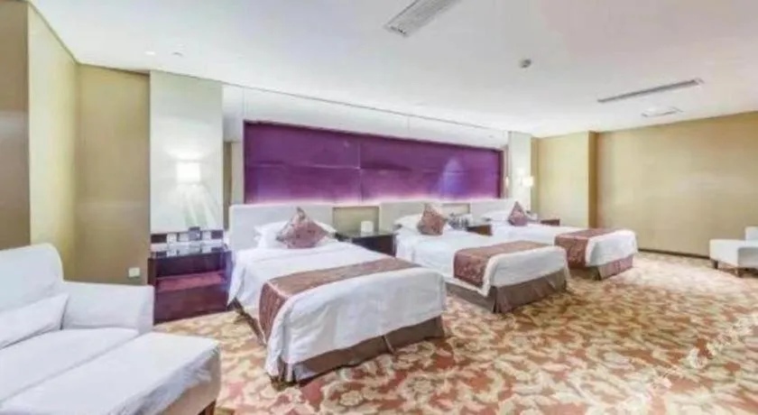 Bed in West International Trade Grand Hotel