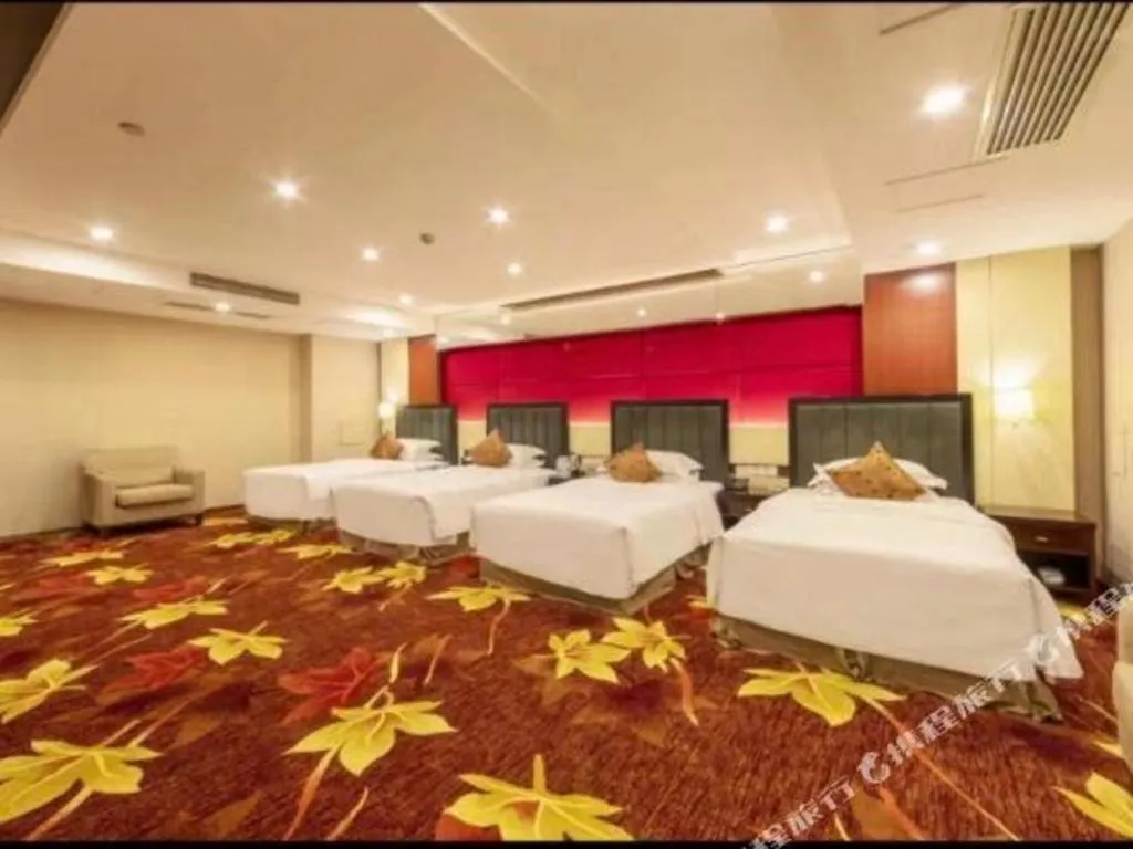 Bed in West International Trade Grand Hotel