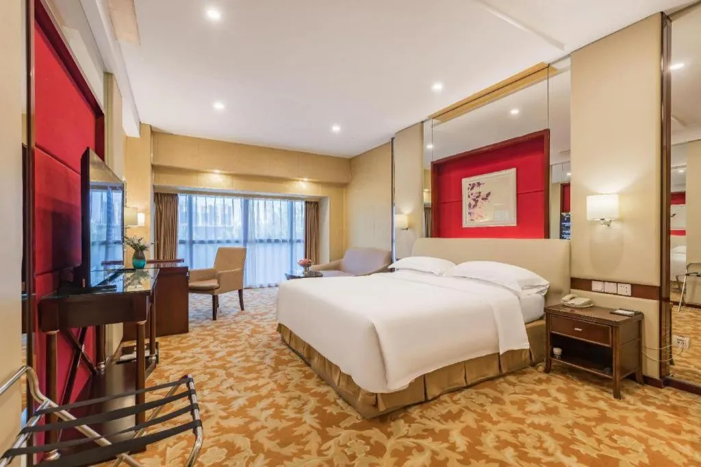 Bed in West International Trade Grand Hotel