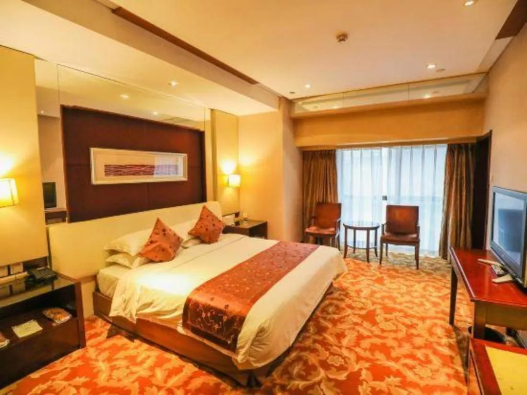 Bed in West International Trade Grand Hotel