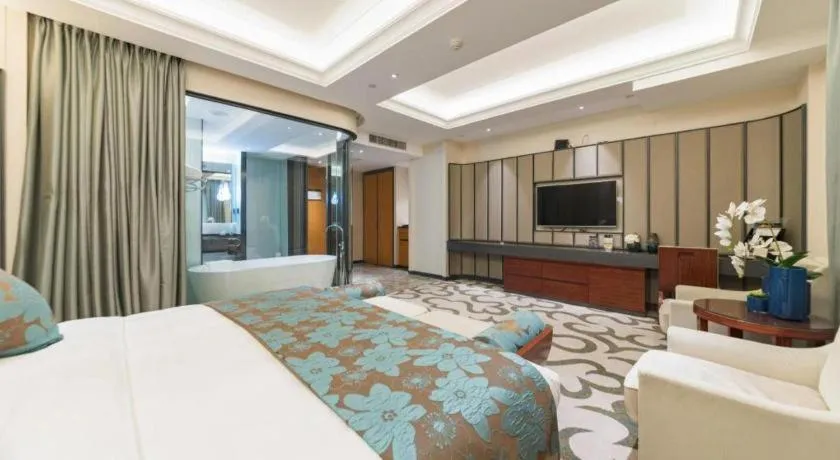 Bed in West International Trade Grand Hotel