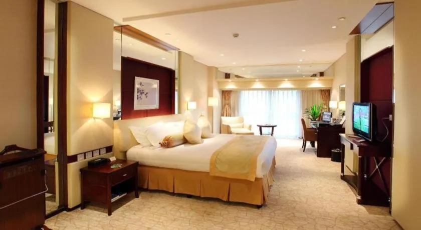 Bed in West International Trade Grand Hotel