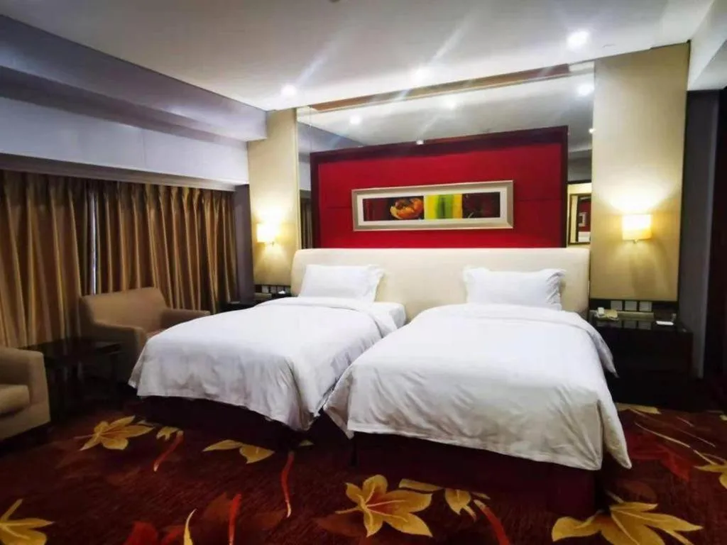 Bed in West International Trade Grand Hotel