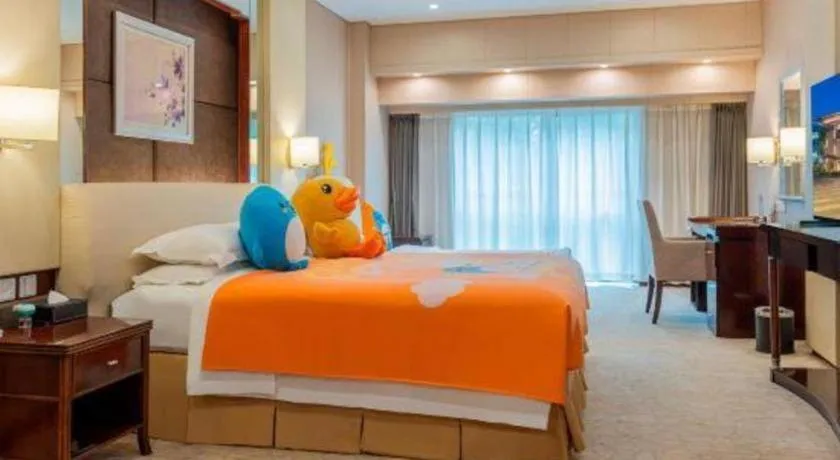 Bed in West International Trade Grand Hotel