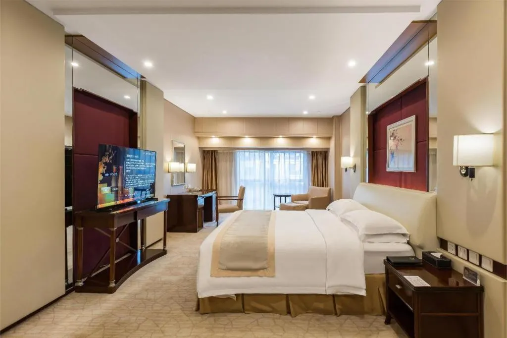 Bed in West International Trade Grand Hotel