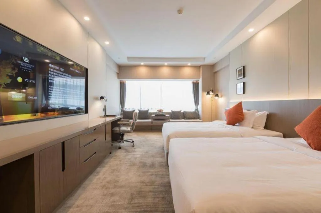 Bed in West International Trade Grand Hotel