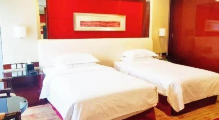 Bed in West International Trade Grand Hotel