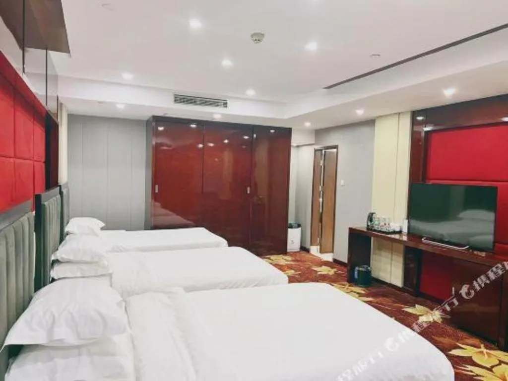 Bed in West International Trade Grand Hotel