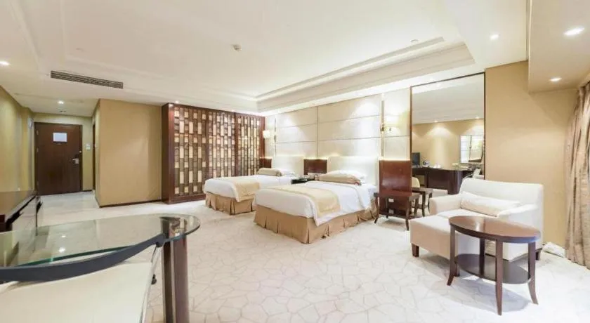 Bed in West International Trade Grand Hotel