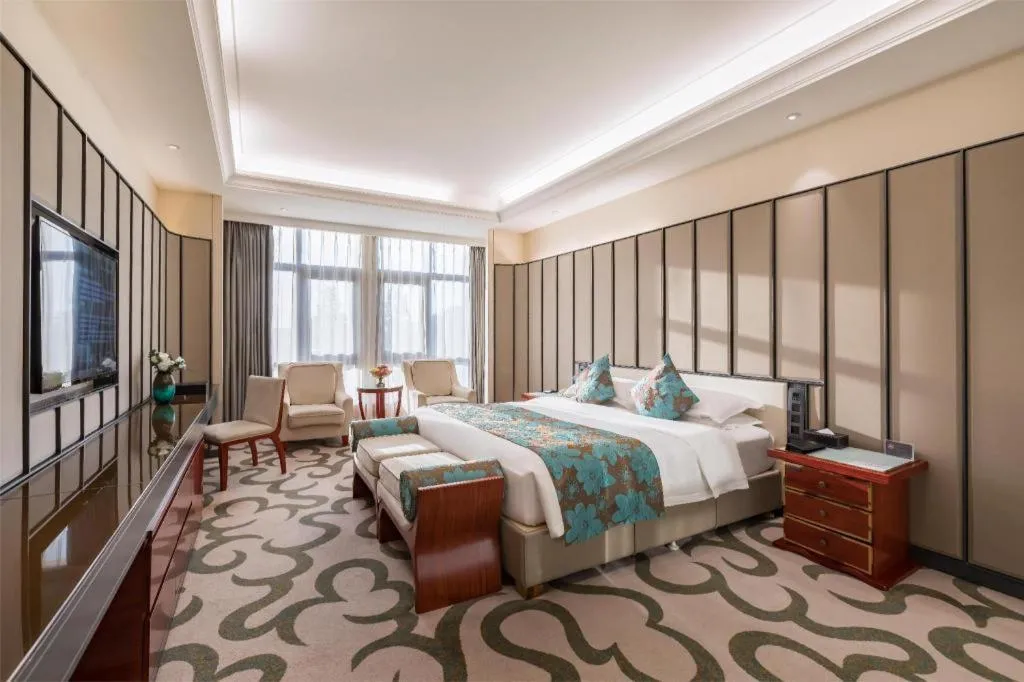 Bed in West International Trade Grand Hotel