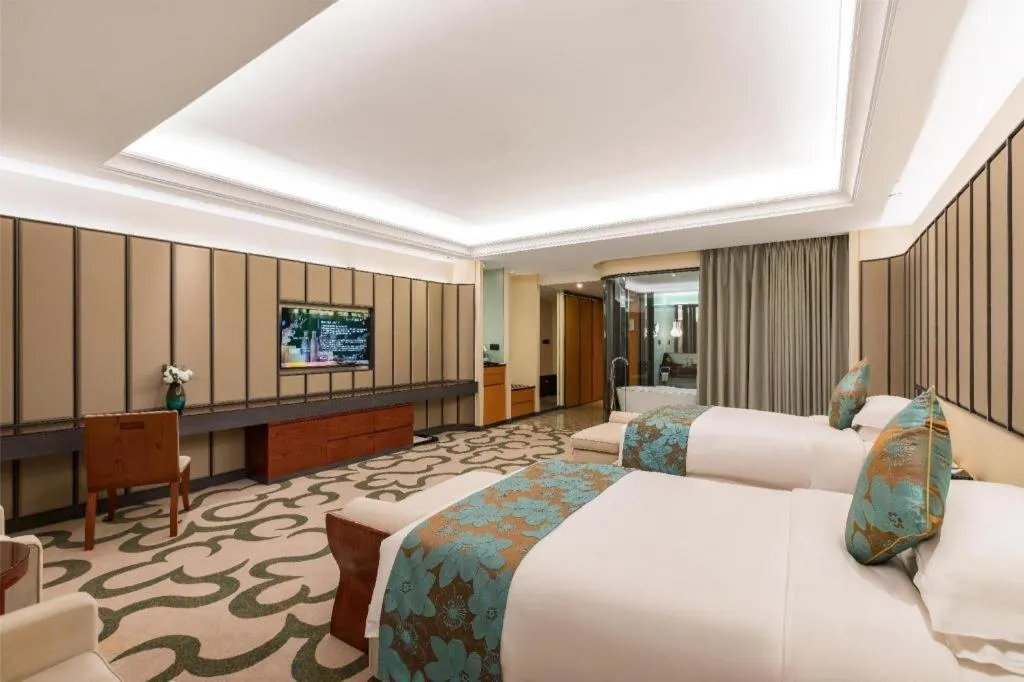 Bed in West International Trade Grand Hotel