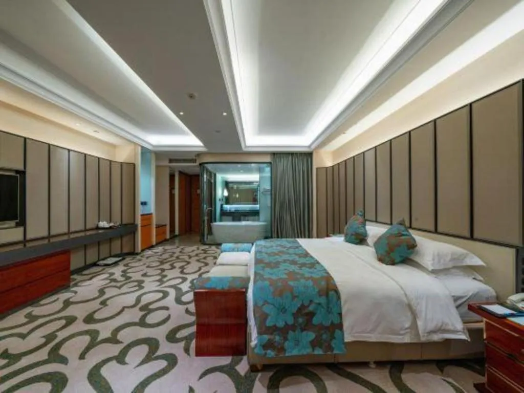 Bed in West International Trade Grand Hotel