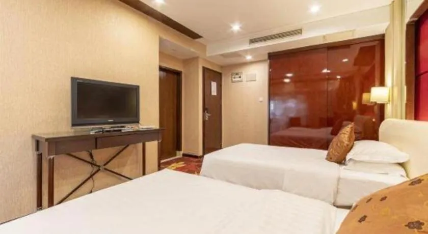 Bed in West International Trade Grand Hotel