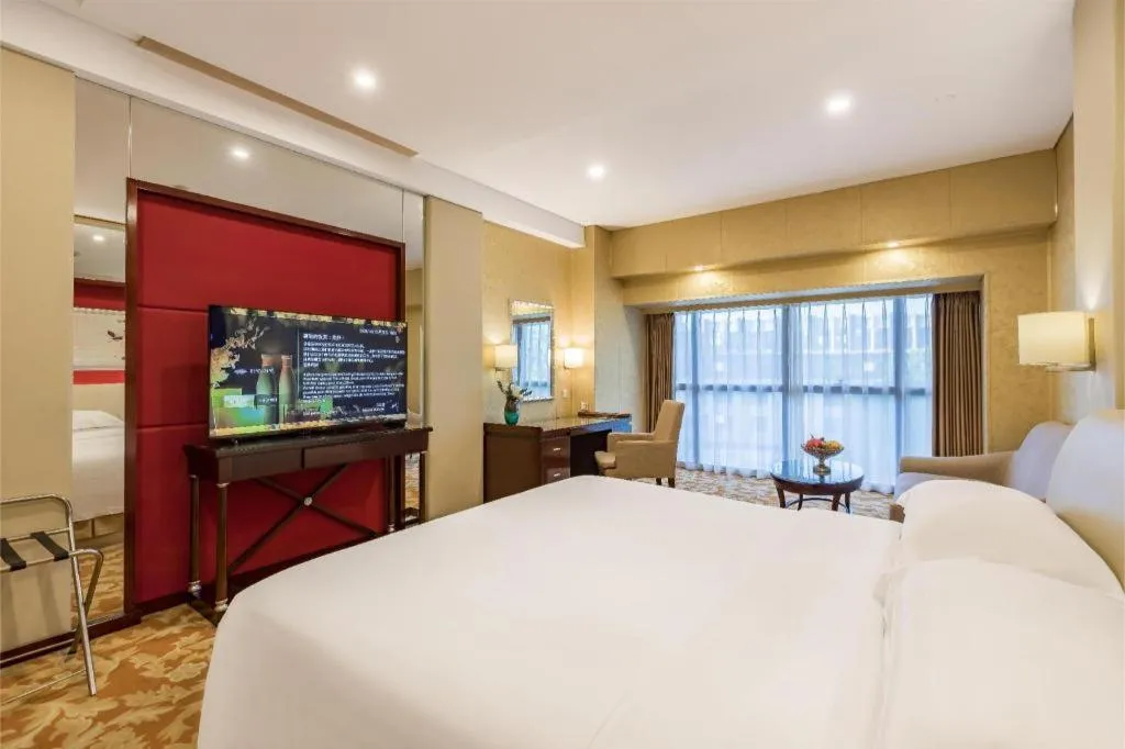 Bed in West International Trade Grand Hotel