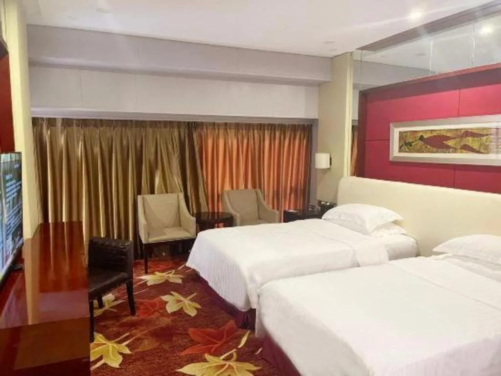 Bed in West International Trade Grand Hotel