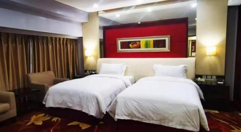 Bed in West International Trade Grand Hotel