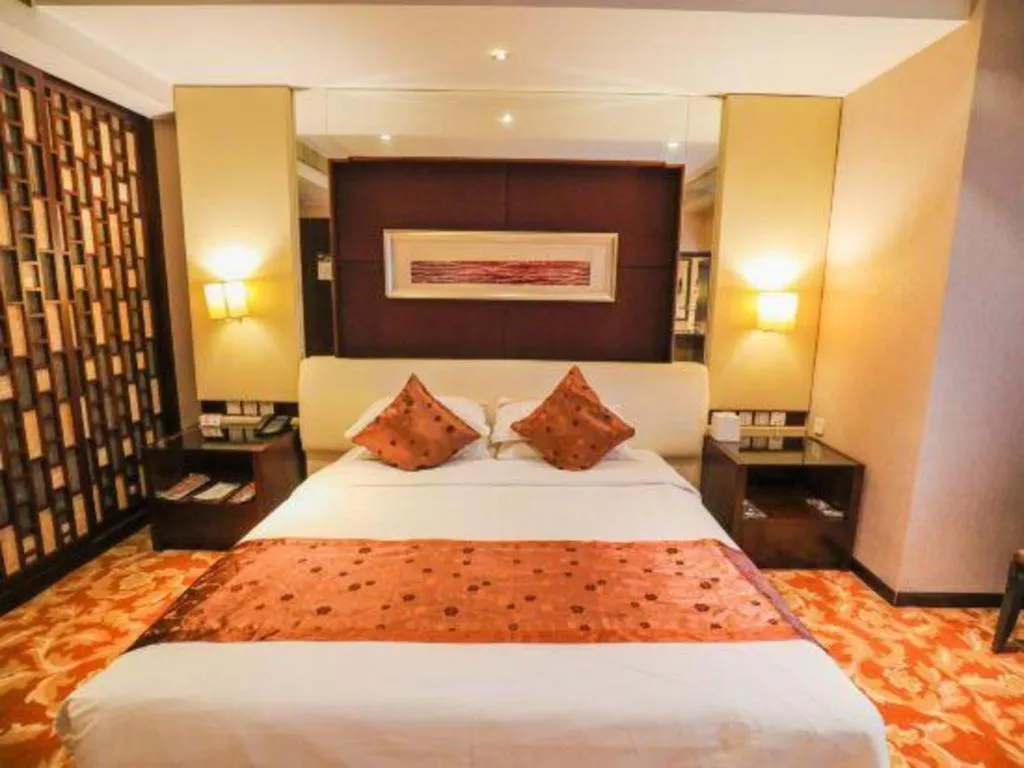 Bed in West International Trade Grand Hotel