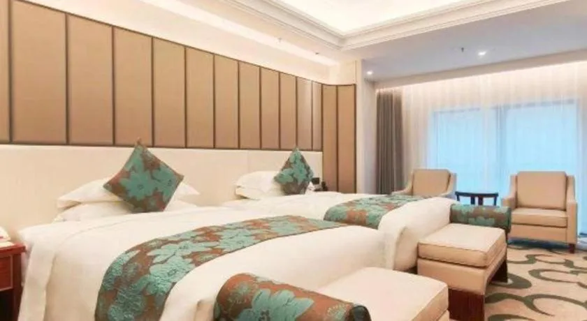 Bed in West International Trade Grand Hotel