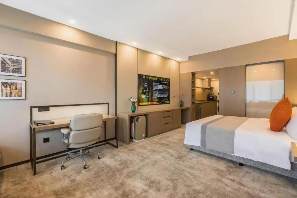 Bed in West International Trade Grand Hotel