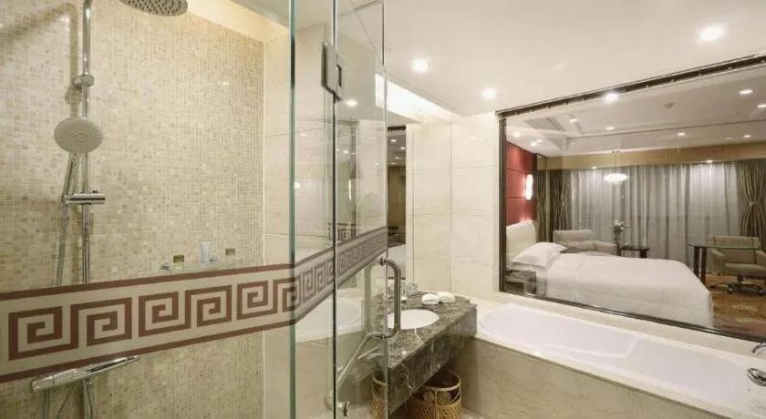 Bed in West International Trade Grand Hotel