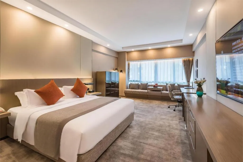 Bed in West International Trade Grand Hotel