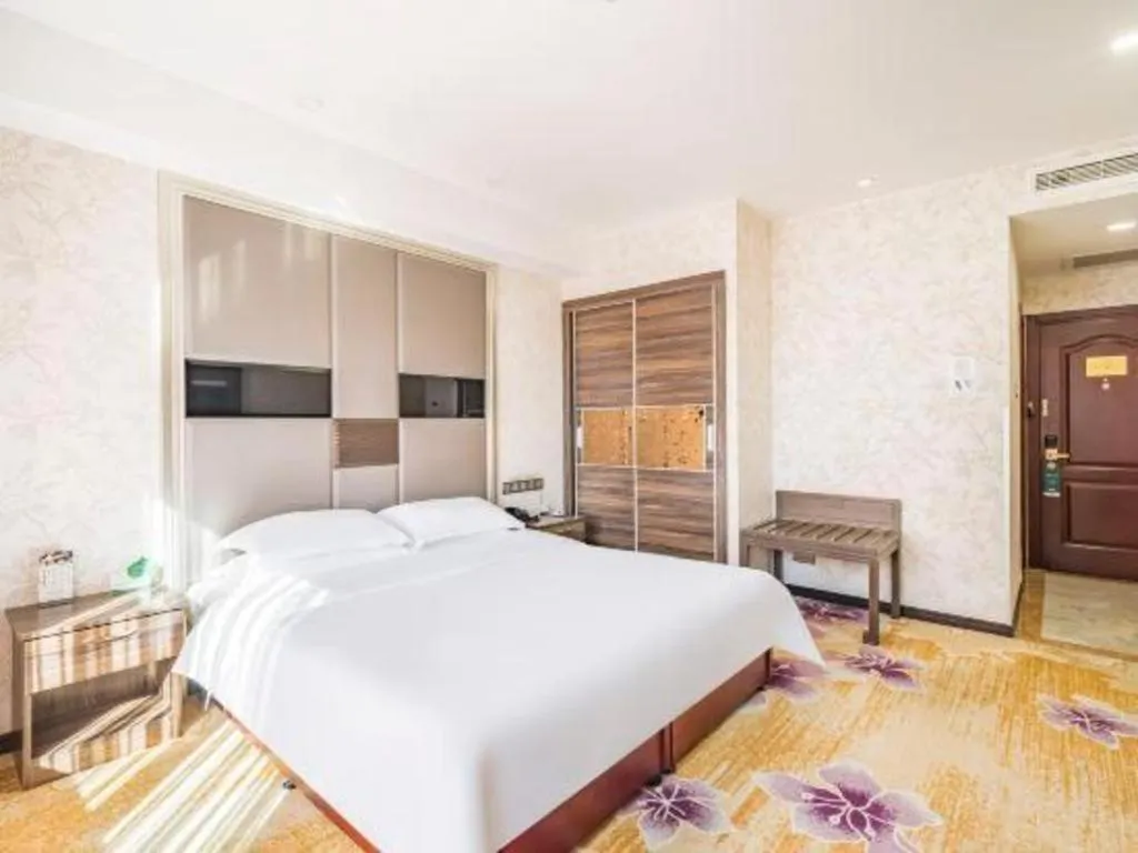 Bed in Beijing Ruyi Business Hotel