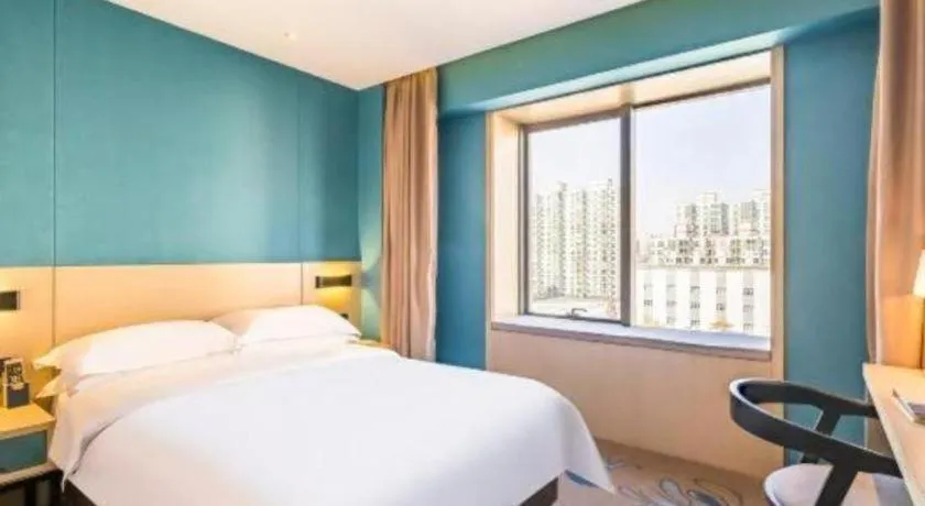 Bed in Beijing Ruyi Business Hotel