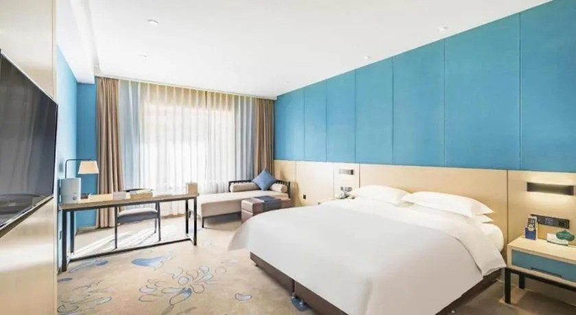 Bed in Beijing Ruyi Business Hotel