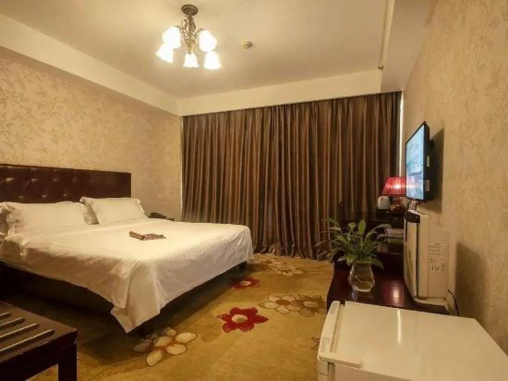 Bed in Beijing Ruyi Business Hotel