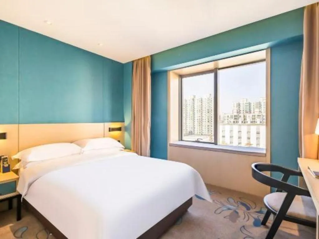 Bed in Beijing Ruyi Business Hotel