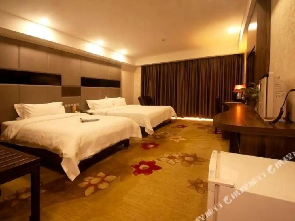 Bed in Beijing Ruyi Business Hotel