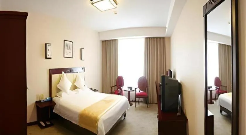 Bed in Beijing Ruyi Business Hotel