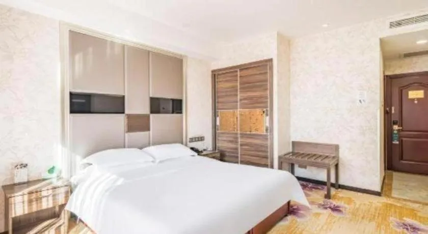 Bed in Beijing Ruyi Business Hotel