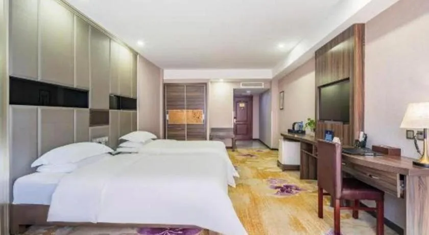 Bed in Beijing Ruyi Business Hotel