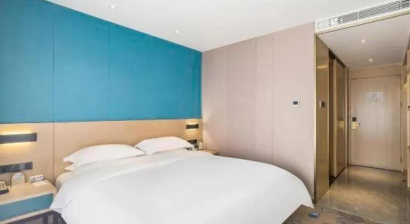 Bed in Beijing Ruyi Business Hotel