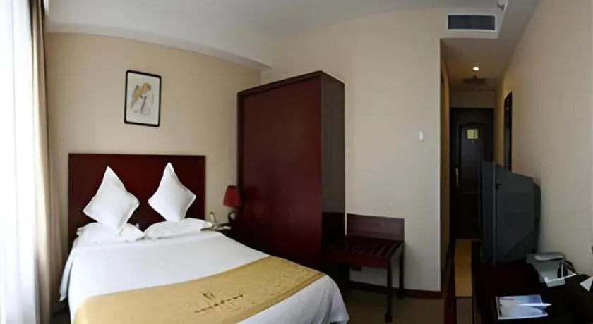 Bed in Beijing Ruyi Business Hotel