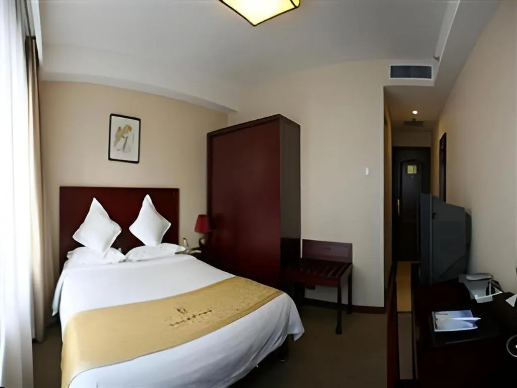 Bed in Beijing Ruyi Business Hotel