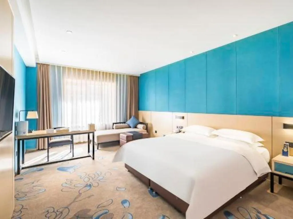 Bed in Beijing Ruyi Business Hotel